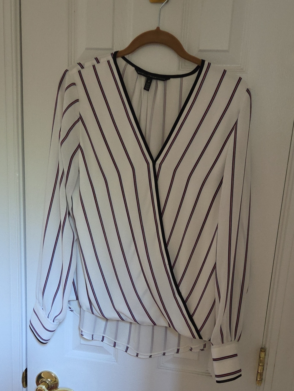 White House Black Market White Blouse with Red, Blue Stripes and Black Trim.